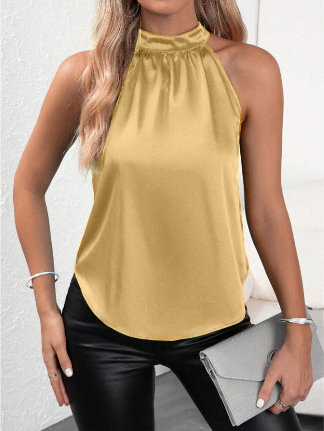 Elevan cualquier look al instante. Esta blusa de satén con cuello halter y caída fluida combina sofisticación y frescura en una sola prenda. Diseñada sin mangas y con una textura satinada suave de acabado brillante, es la pieza perfecta para pasar de una